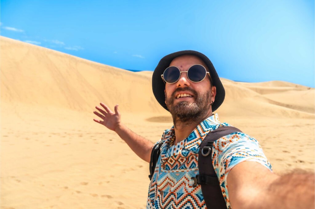 Selfie Of A Tourist With Glasses And Hat Enjoying TQTBCYC 1024x682